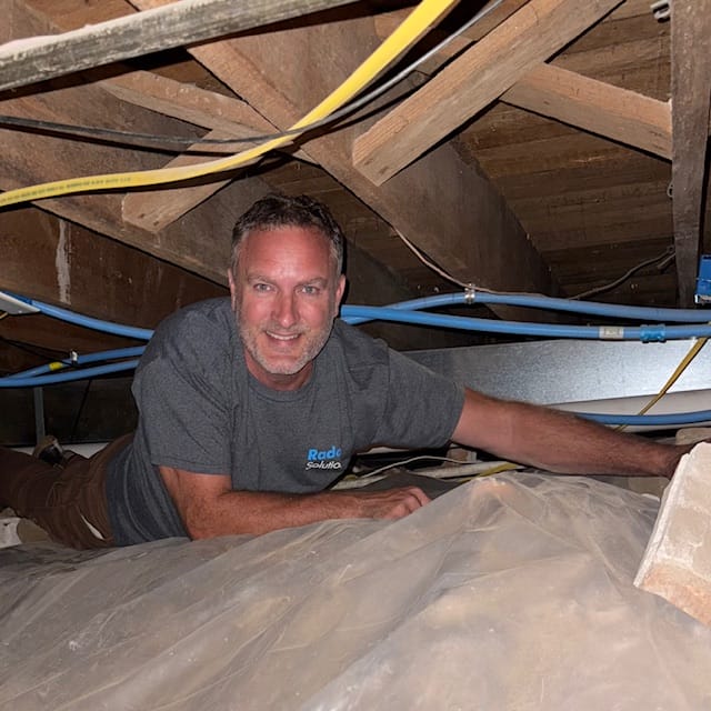 Man Inspecting Crawl Space Encapsulation
